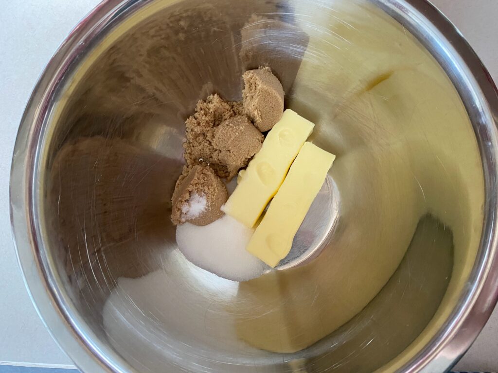 Butter and sugars in bowl 