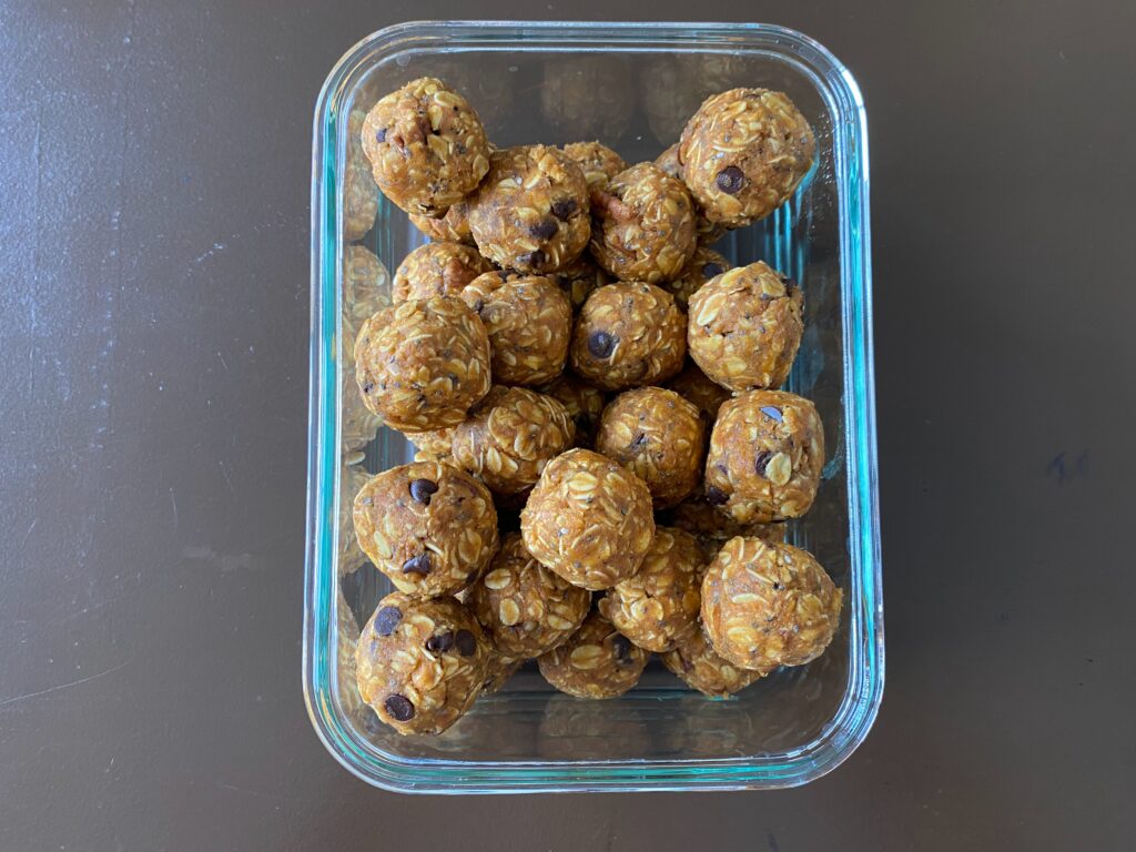 finished energy bites in Glass container