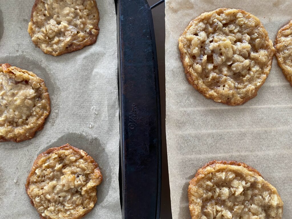 baked cookies on rack and pan